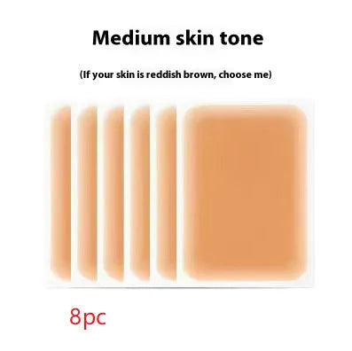 Tattoo cover patch and a 130mm long concealer brush on a table, with colour option swatches visible.