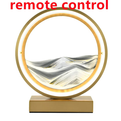 Black and white quicksand table lamp, 295mm tall with LED lights and remote control, coloured sand in glass chamber