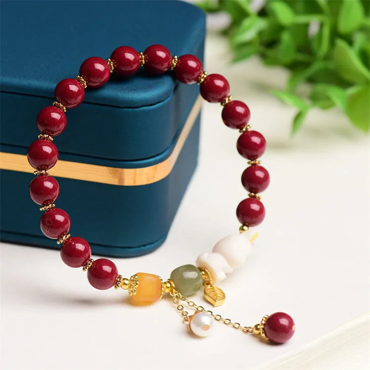 Natural cinnabar rabbit bracelet in beeswax purple and gold sand, national style, shown in 8mm and 10mm sizes.