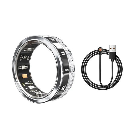 Gold and silver diamond-inlaid smart ring for blood oxygen monitoring on a finger.