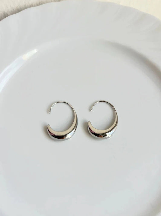 Gold and silver retro fashion earrings with snake design elements and electroplated finish