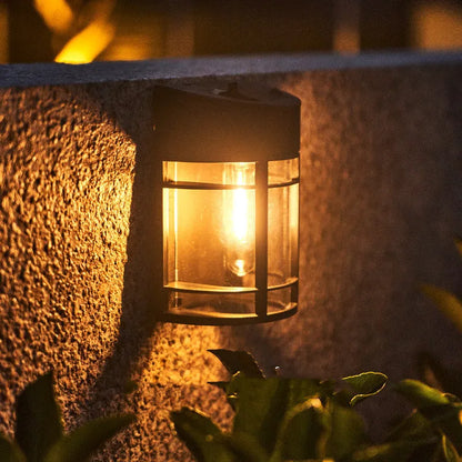 Solar outdoor wall light with warm illumination for garden and patio areas