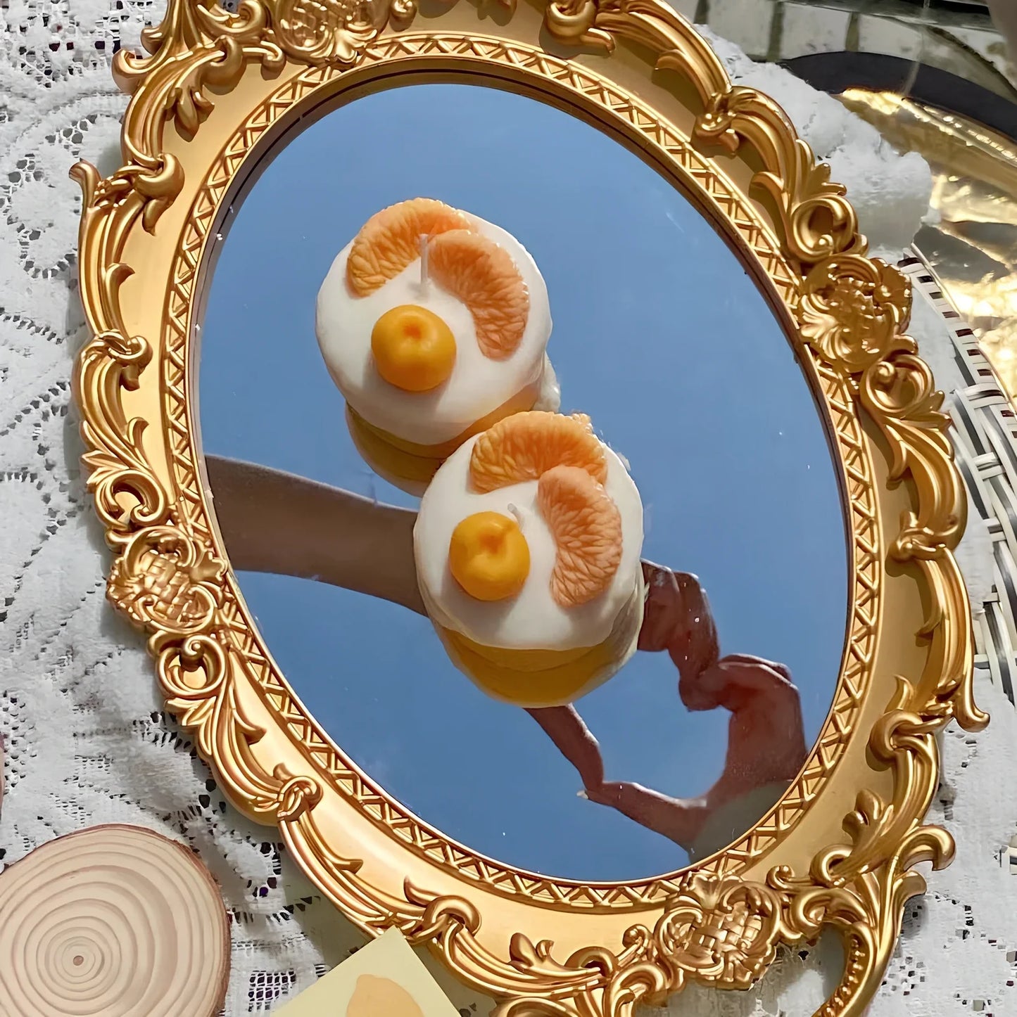 Handmade orange soy wax candle with 5cm diameter and 6cm height in cylindrical shape