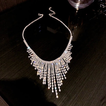 Silver tone tassel necklace with geometric alloy pendant and ball bead chain, 21-50cm circumference