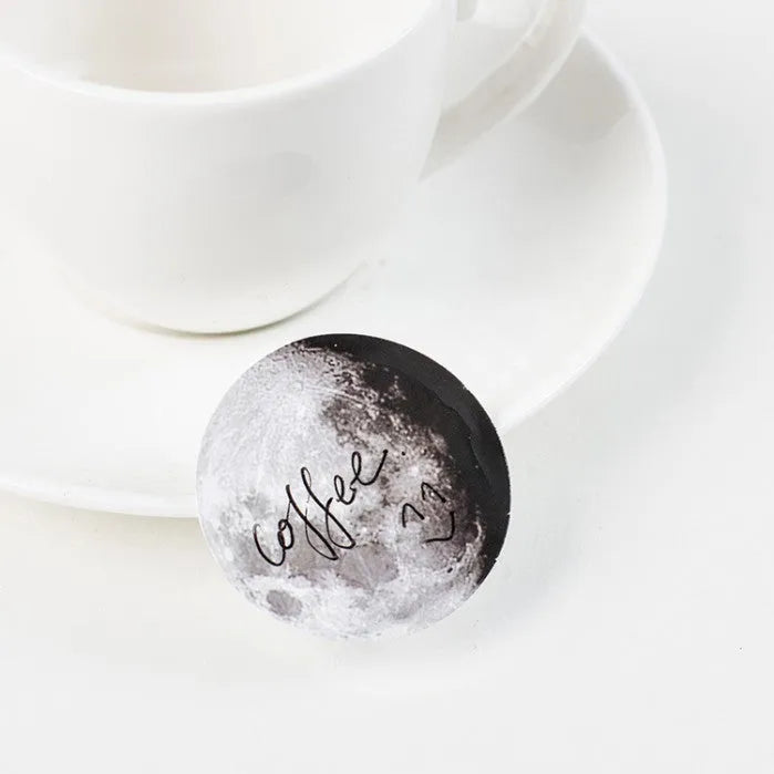 Black moon phase and calendar planet sticker set containing 45 pieces in box packaging