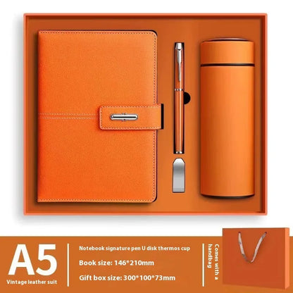 A5 notebook with imitation leather cover in a choice of colours including black, red, green, blue, and orange.