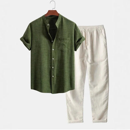 Men's blue slim-fit short-sleeved shirt with stand collar, part of a casual set with pants and shoes.