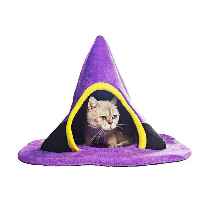 Purple witch hat shaped cat bed measuring 60cm by 45cm with cloth material
