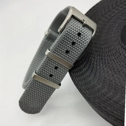 Integrated nylon watch strap in Army Green colour showing textile construction and attachment to watch lugs