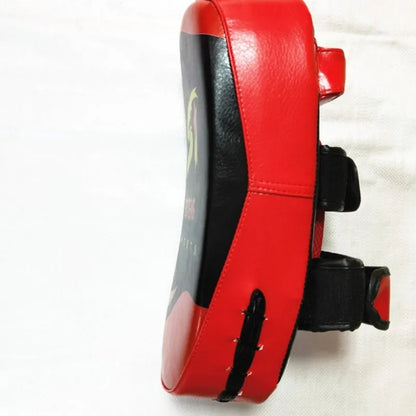 Black with red edges hand-held martial arts target showing 35cm by 19cm striking surface and double adhesive buckle