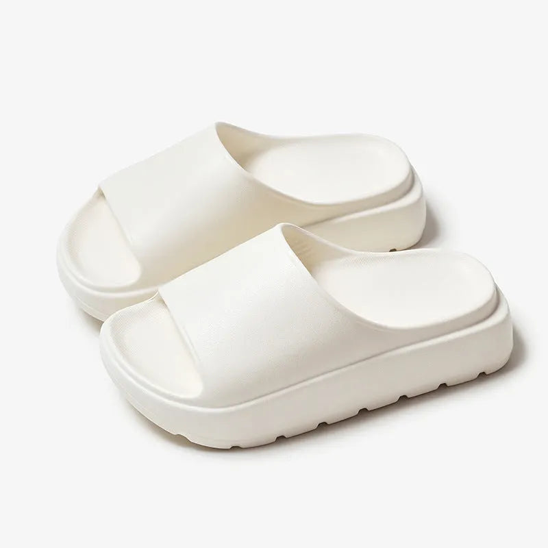 Women's beige 5.5cm thick-soled EVA slippers with injection-moulded construction for bathroom and beach use