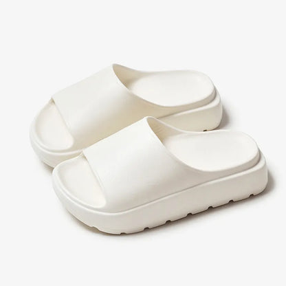 Women's beige 5.5cm thick-soled EVA slippers with injection-moulded construction for bathroom and beach use