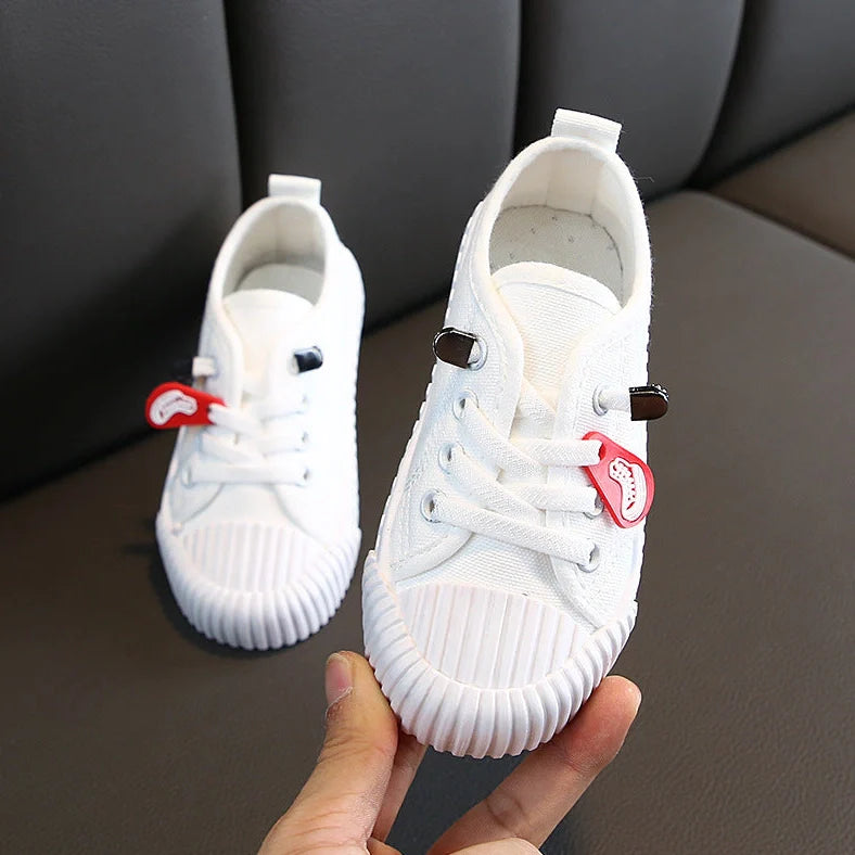 Korean style children's canvas shoes in black, red, yellow or white with non-slip rubber soles