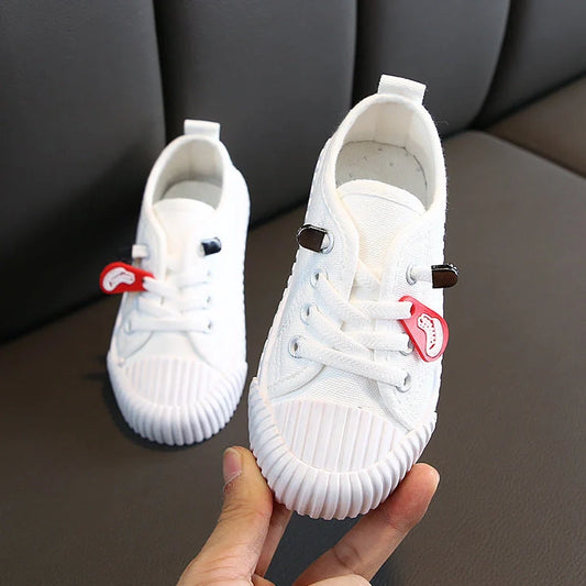 Korean style children's canvas shoes in black, red, yellow or white with non-slip rubber soles