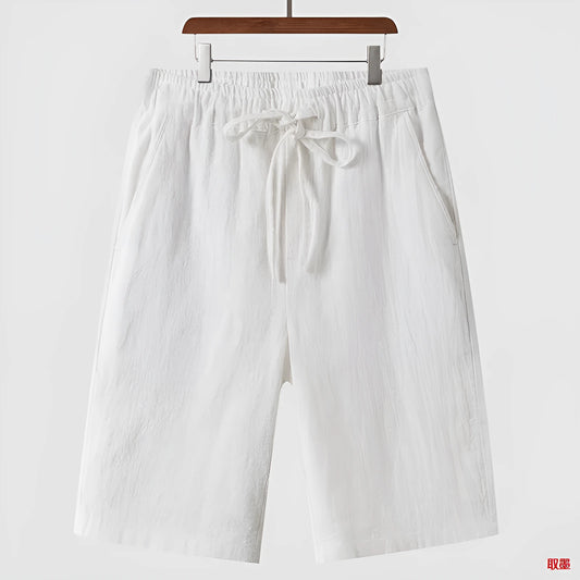 Men's linen casual shorts with elastic waistband in loose cropped design showing beige colour option