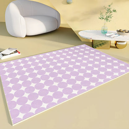 Rectangular checkboard pattern rug in dark green with geometric squares on living room floor