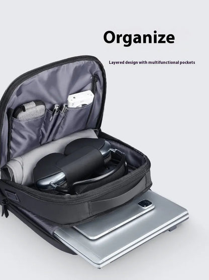 Graphite grey Oxford cloth USB business backpack with charging port and under 20-litre capacity.