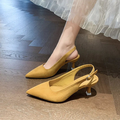 Apricot suede women's pointed-toe stiletto high heels on a plain background.