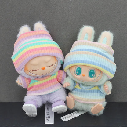 Doll clothes set with knitted flanging hat and T-shirt in multiple colours including pink, white, and stripes.