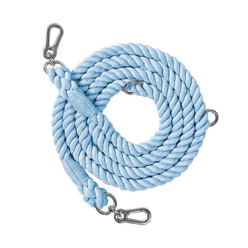 Woven rainbow pattern dog leash with double grip handles and a metal clasp.