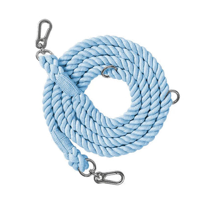 Woven rainbow pattern dog leash with double grip handles and a metal clasp.