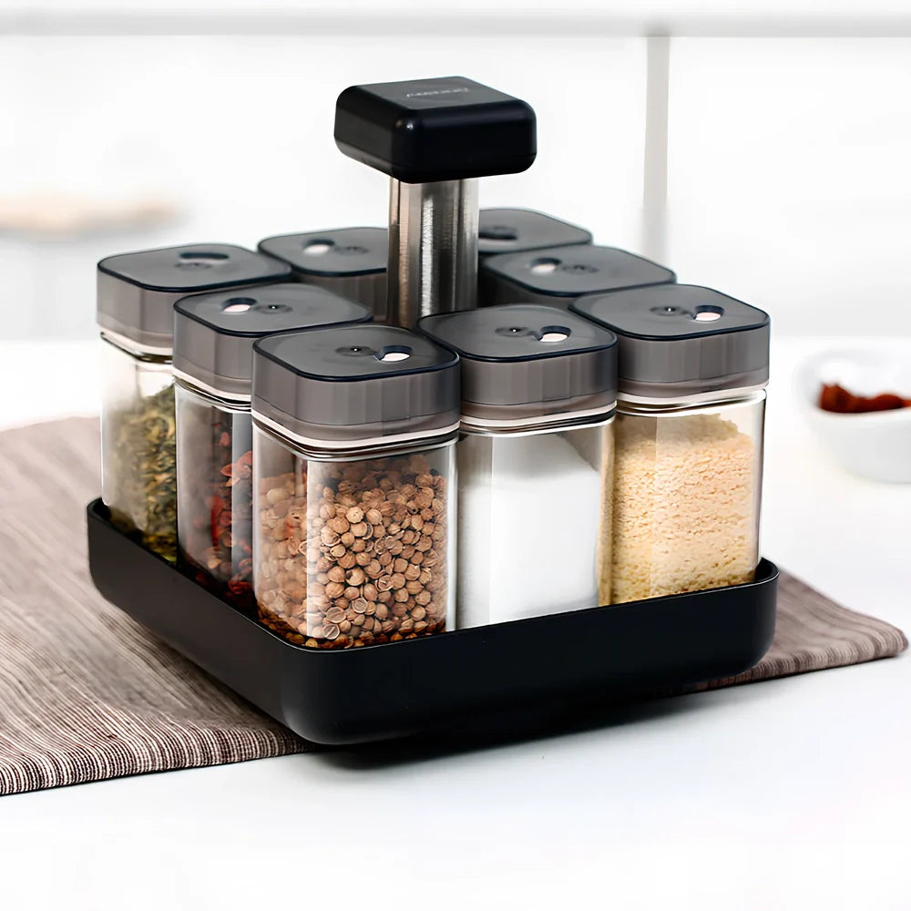 Six clear glass spice jars with natural bamboo lids in stackable configuration