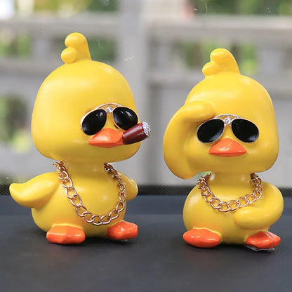 Little yellow duck resin car interior ornament in social duck poses with gold glasses and gold necklace