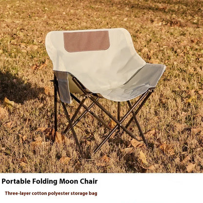 Portable folding camping chair with steel frame and Oxford fabric in outdoor setting