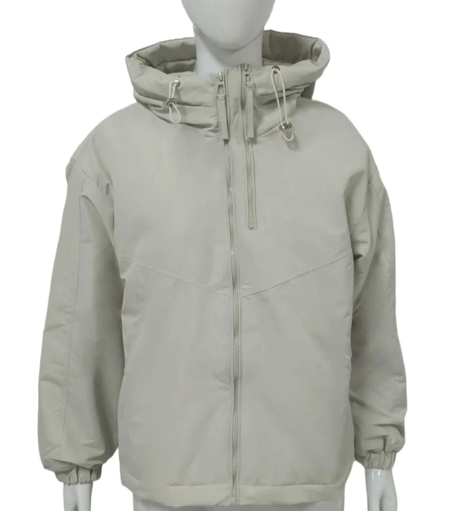 Women's grey hooded shell jacket with loose fit and long sleeves on hanger