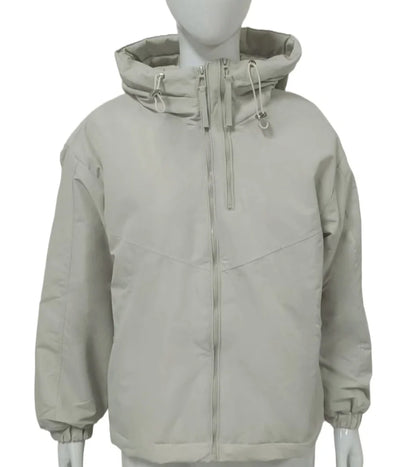 Women's grey hooded shell jacket with loose fit and long sleeves on hanger