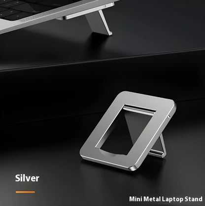 Folded aluminium laptop bracket showing compact 4.8cm size with 3M adhesive tabs