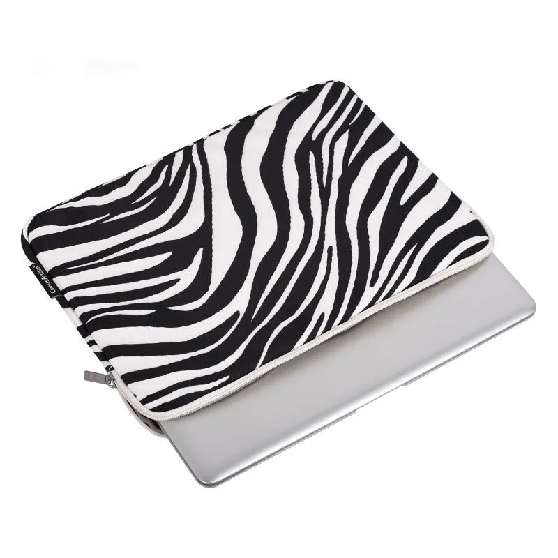 Black and white zebra pattern polyester protective sleeve for a digital notebook, available in 11 to 17 inch sizes