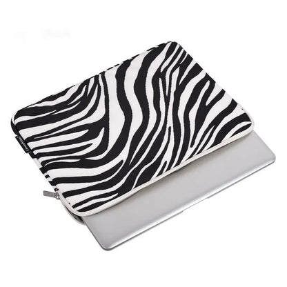 Black and white zebra pattern polyester protective sleeve for a digital notebook, available in 11 to 17 inch sizes