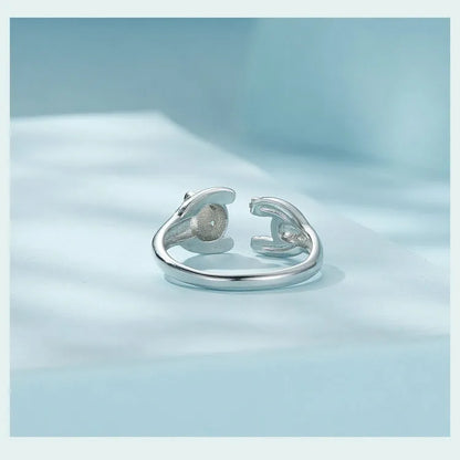 Adjustable panda open ring bracelet in sterling silver with white gold plating, showing animal modelling details and open design