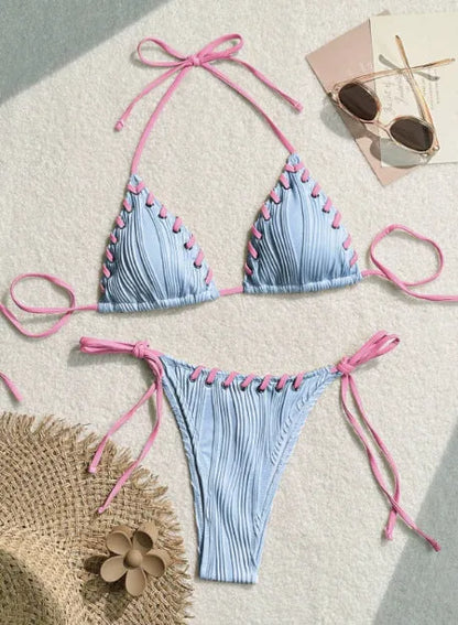 Women's solid colour polyester bikini with eye rope detail, briefs style, sizes S M L