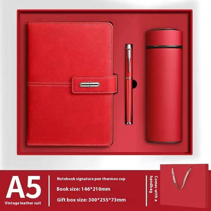 A5 notebook with imitation leather cover in a choice of colours including black, red, green, blue, and orange.