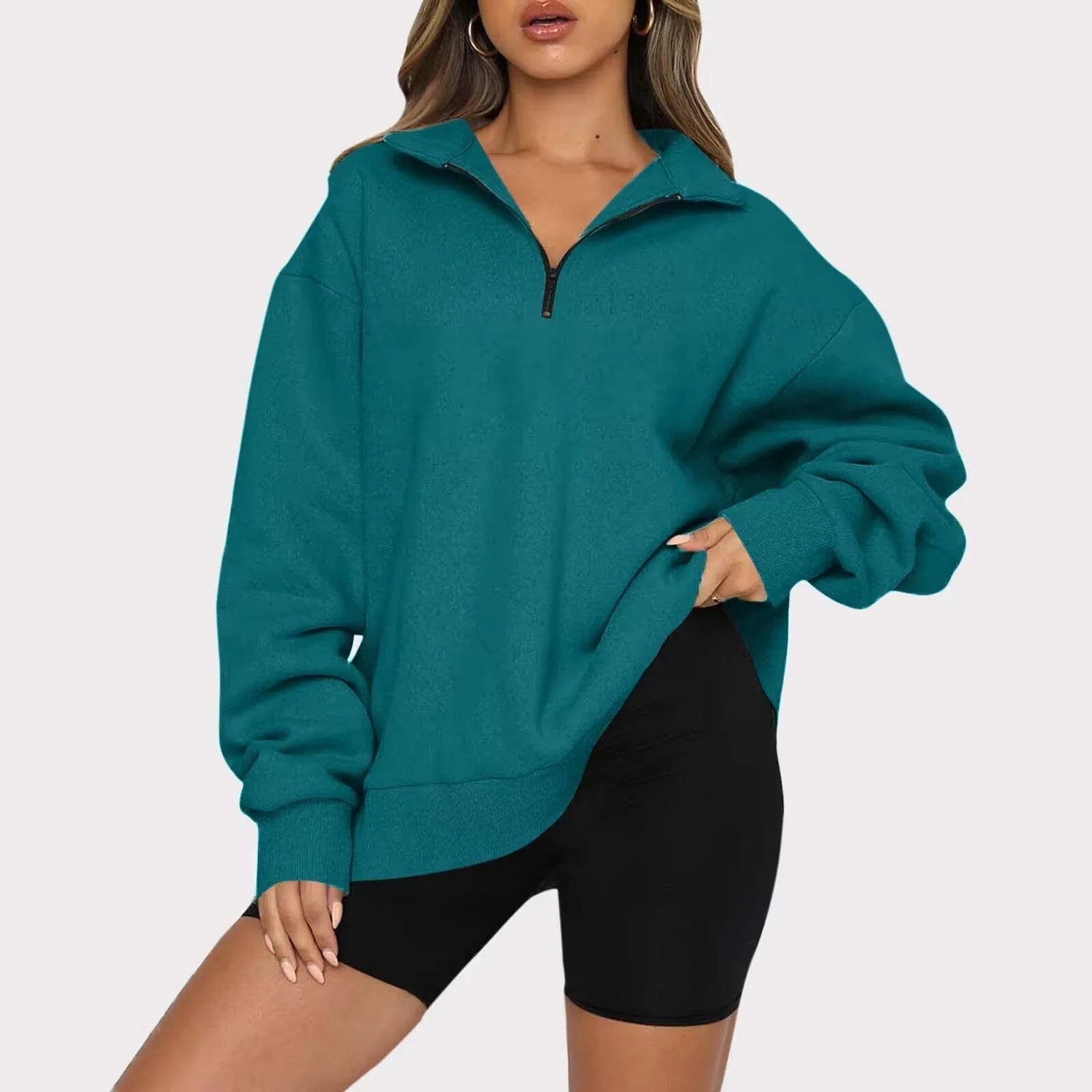 Women's zip turndown collar sweatshirt in various colors, showcasing loose fit and zipper detail.