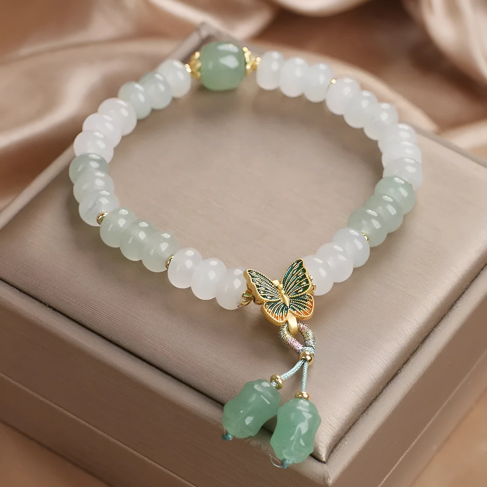 Green Tian Shan Cui jade abacus beads bracelet with retro butterfly tassel and crystal decoration