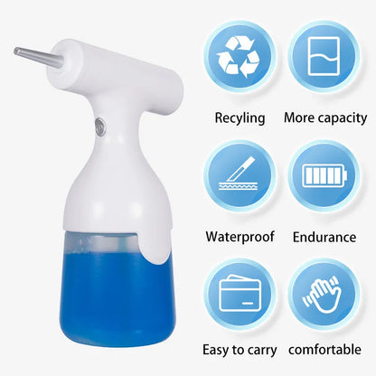 White electric automatic foam dispenser gun on a bathroom counter next to a sink