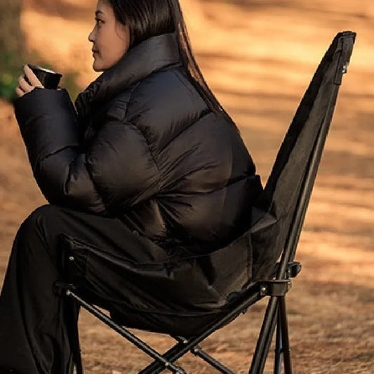 Night black Oxford cloth moon style folding camping chair with curved backrest in open position