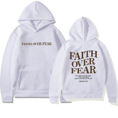 A stylish Christian hoodie with inspirational graphics and a message of faith over fear