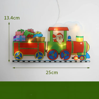 LED Christmas hanging lights with suction cups showing snowman design illuminated on window