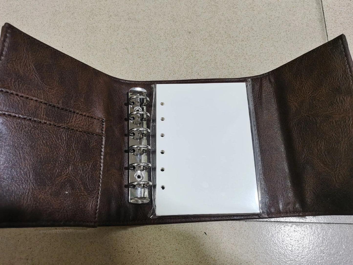 Brown A7 retro leather buckle notebook with loose-leaf binding on PU cover