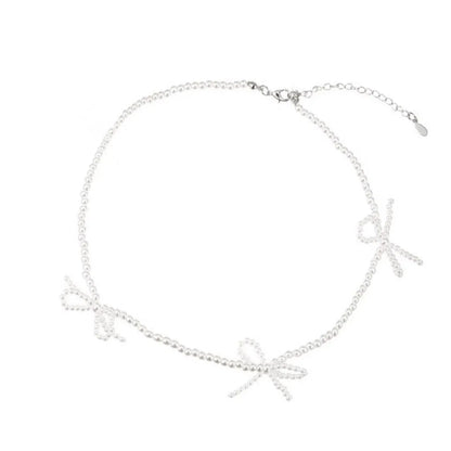 White adjustable sweet bow pearl necklace for women with geometric design and 31-40cm length