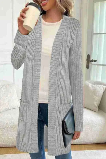 A loose-fit long sleeve knitted cardigan jacket with pockets, shown in black, grey, or wine red.