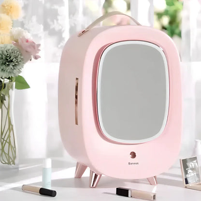 Pink makeup refrigerator with 13-litre capacity for cosmetic storage measuring 440mm wide