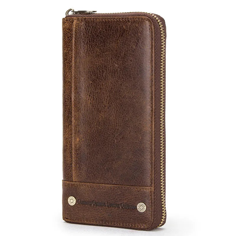 Men's brown genuine cowhide leather long wallet open to show card slots, RFID protection symbol, and zippered coin section.