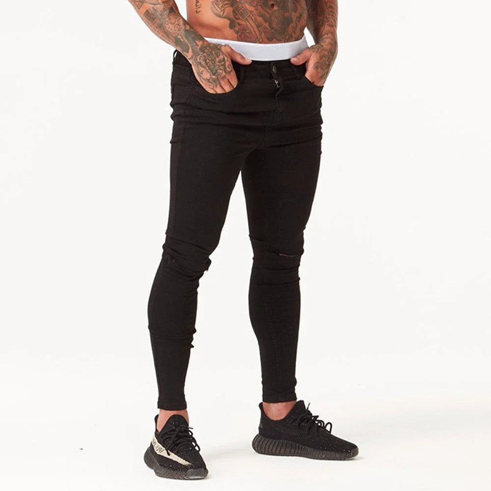 Premium Distressed Men's Skinny Jeans in Black, featuring a skinny silhouette and trendy distressed details for a casual cool style.
