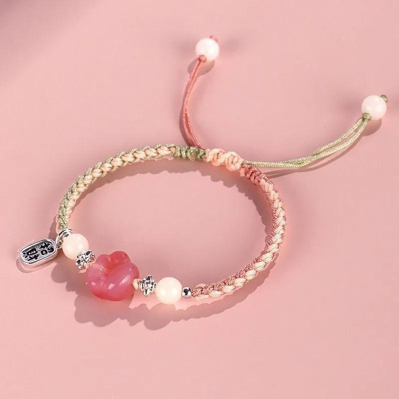 Red cat's paw woven couple bracelet with glass beads in pastoral style