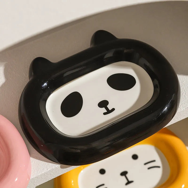 Handcrafted ceramic pet bowl with an animal design, for cat or dog food and water.